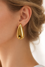 Radient gold tear drop earring - Image 2